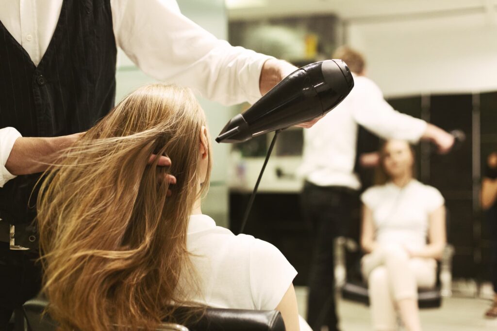 Woman in salon getting a blow-dry